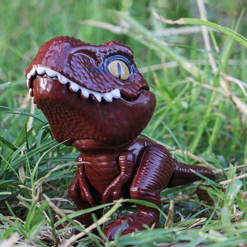 Jouet de dinosaure qui se mord les doigts