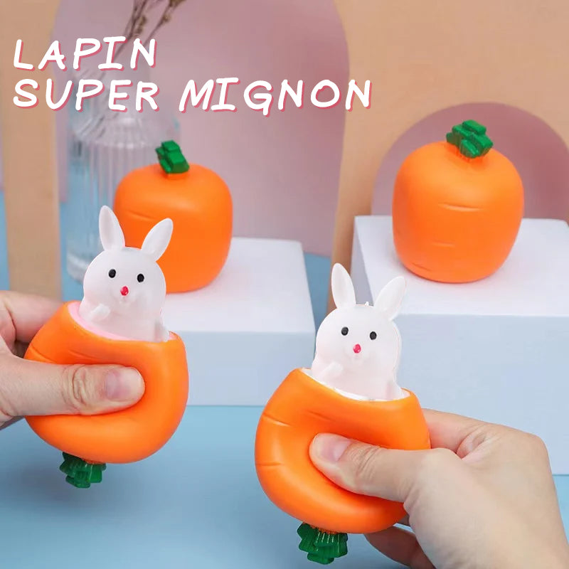 Jouet à presser lapin carotte