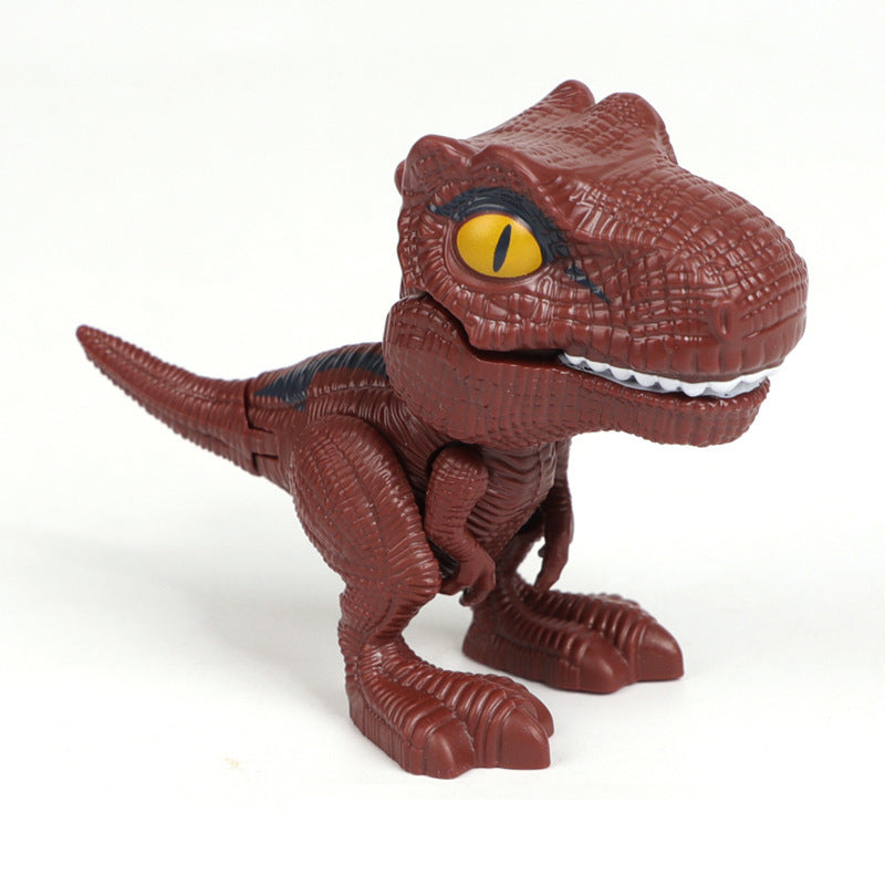 Jouet de dinosaure qui se mord les doigts