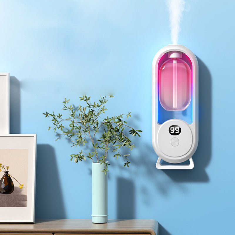 Distributeur automatique de parfum pour la maison