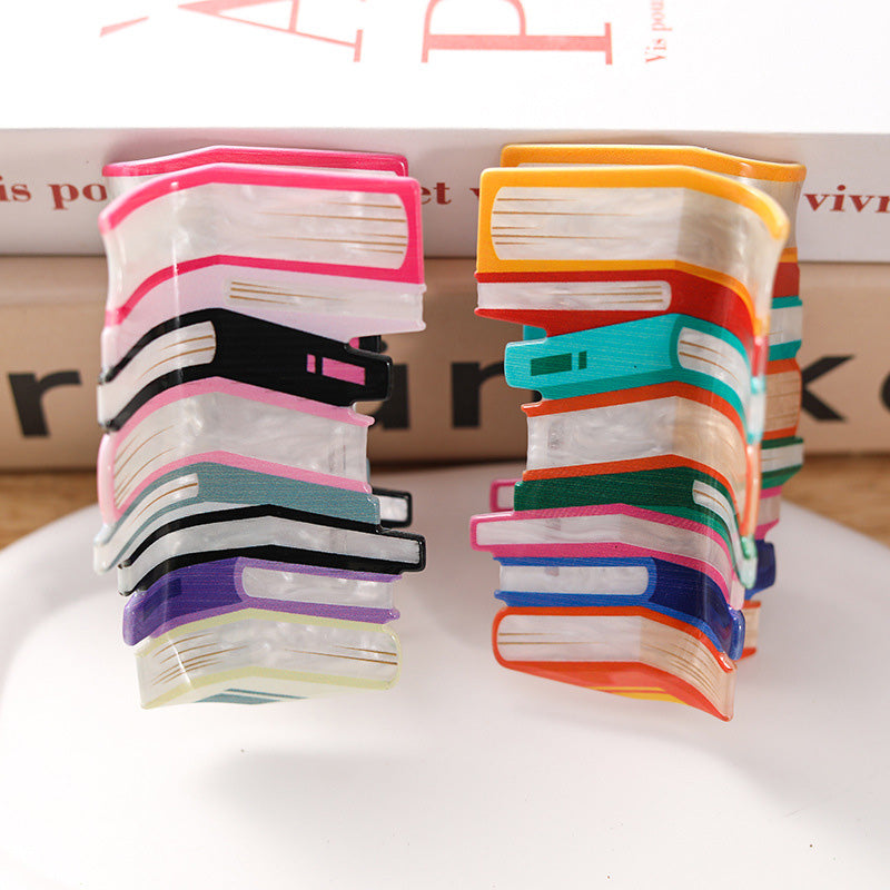 Pince à cheveux livre