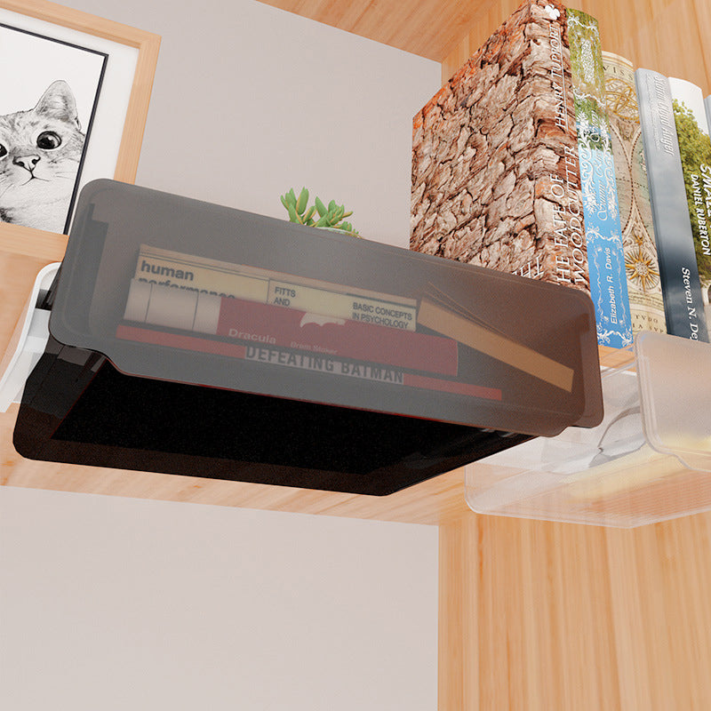 Sous le tiroir du bureau