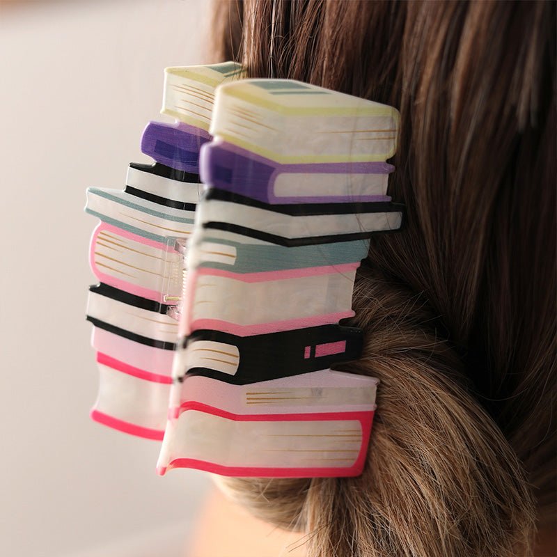 Pince à cheveux livre