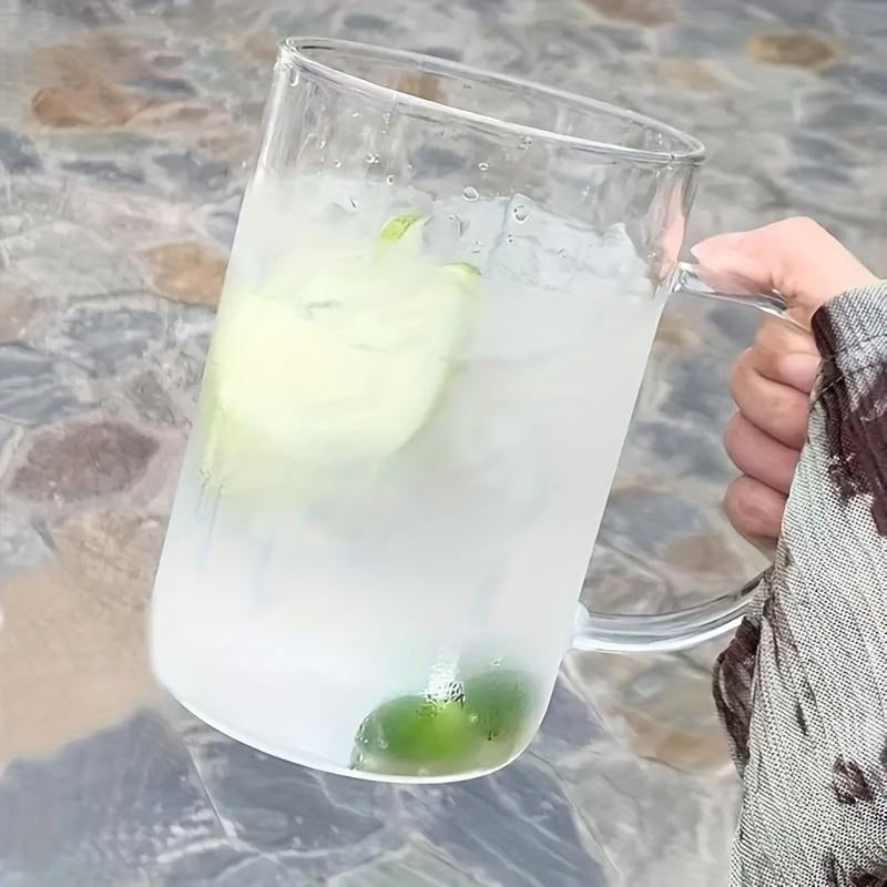 Grande tasse en verre avec couvercle et paille