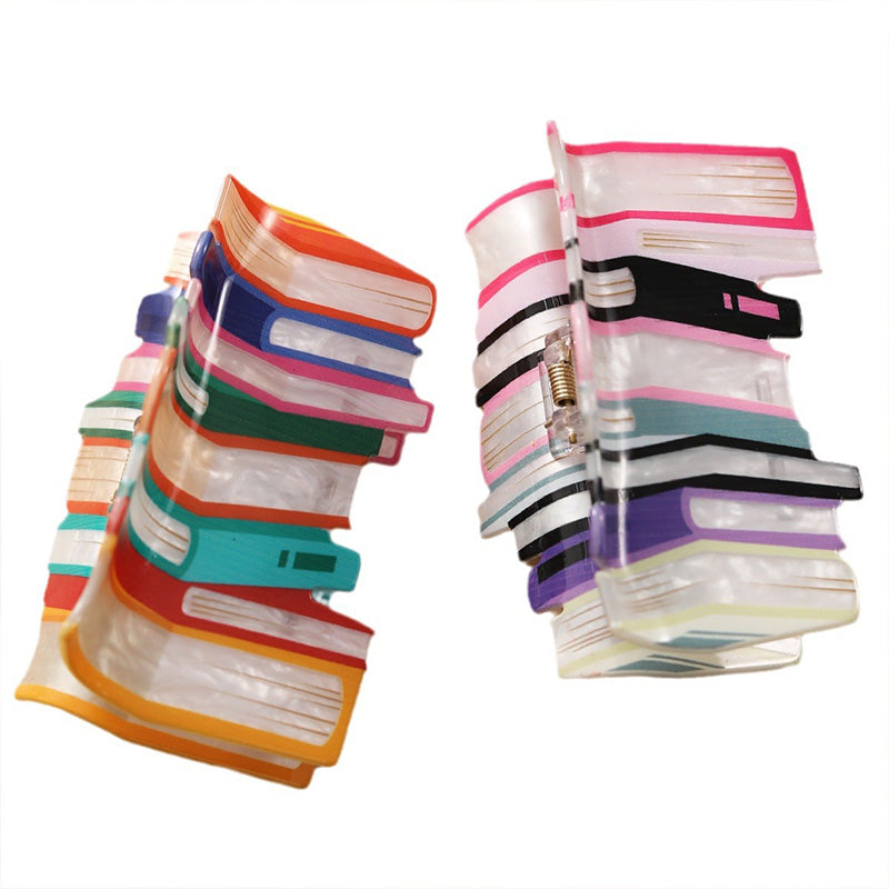 Pince à cheveux livre