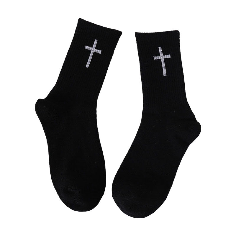 Chaussettes noires et blanches avec croix