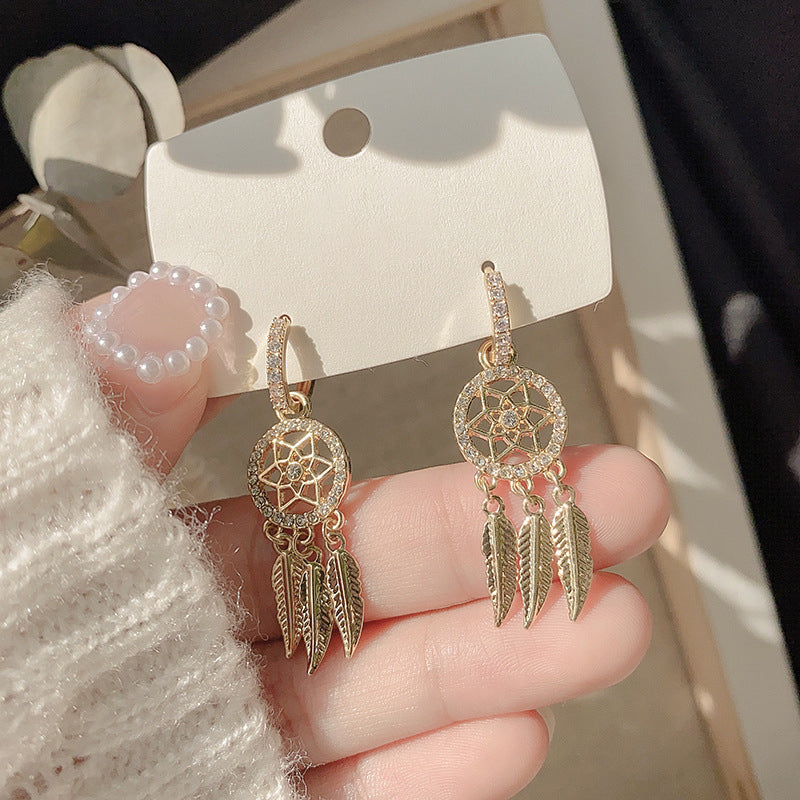 Boucles d'oreilles attrape-rêves tendance