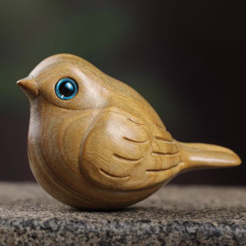 Oiseau sculpté en bois fait à la main