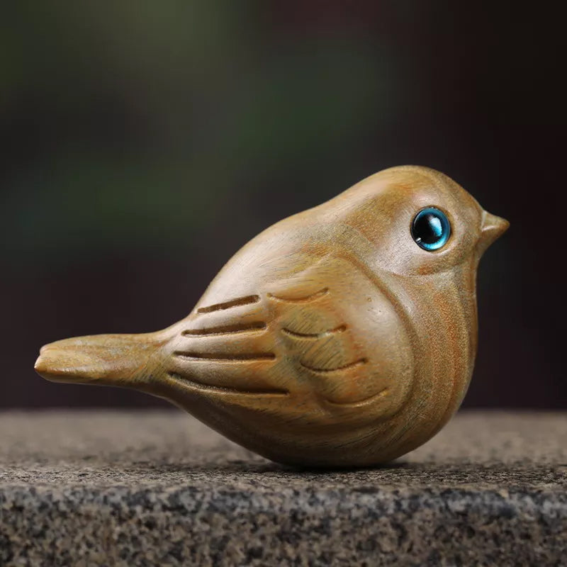 Oiseau sculpté en bois fait à la main