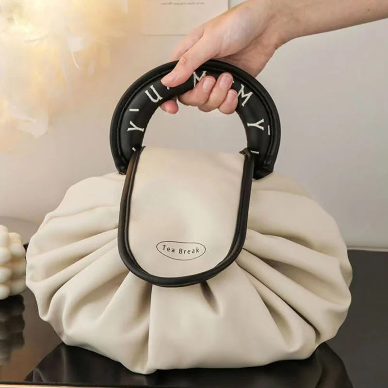 Sac à main avec cordon de serrage pour le maquillage