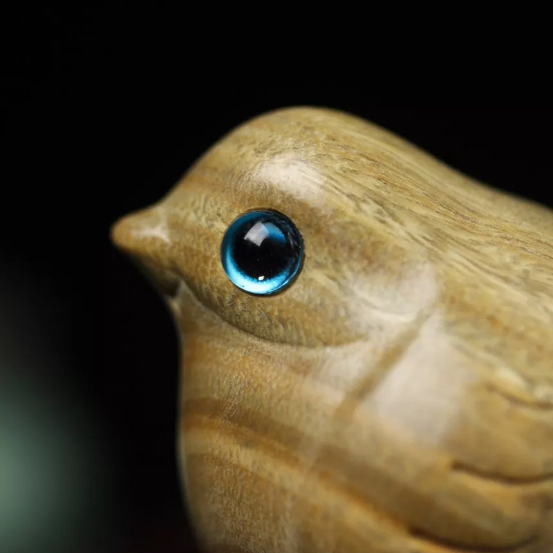 Oiseau sculpté en bois fait à la main